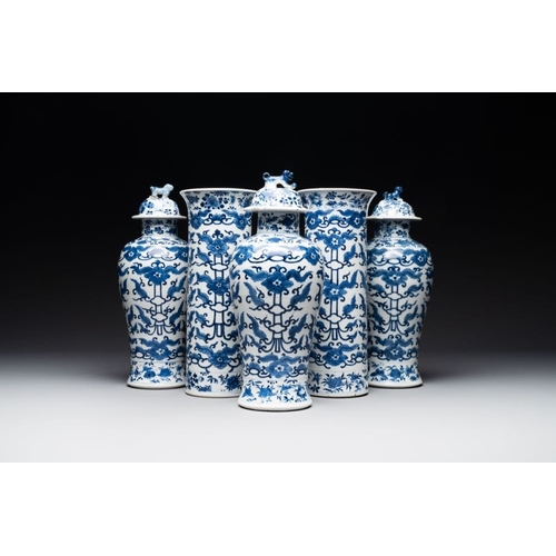 769 - A Chinese blue and white garniture of five vases with lotus scrolls, 19th C.H.: 32,5 cm (the tallest... 