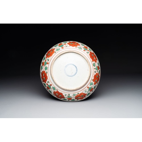 834 - A Chinese red-and-green-enamelled 'chrysanthemum scroll' dish, MingDia.: 31 cm The absence of a cond... 