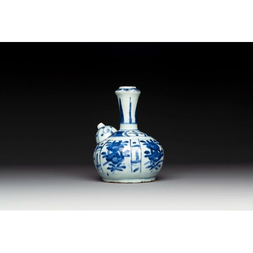 841 - A Chinese blue and white kendi with floral design, WanliH.: 19 cmThe absence of a condition report d... 