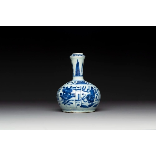 841 - A Chinese blue and white kendi with floral design, WanliH.: 19 cmThe absence of a condition report d... 