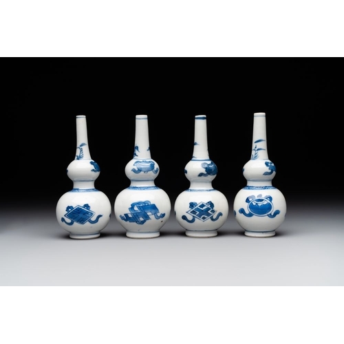 892 - Four Chinese blue and white 'Eight Treasures' double gourd vases, KangxiH.: 12,2 cmThe absence of a ... 