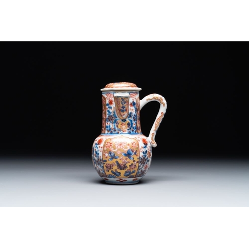 906 - A Chinese English-decorated blue and white jug and cover, KangxiL.: 11 cm - H.: 14,5 cmThe absence o... 