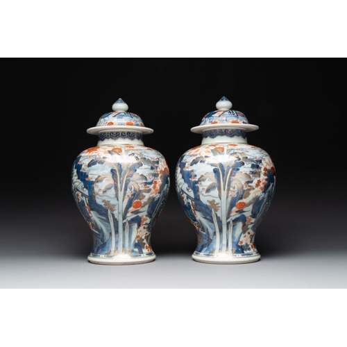 908 - A pair of fine Chinese Imari-style vases and covers with narrative design, KangxiH.: 43,5 cmThe abse... 