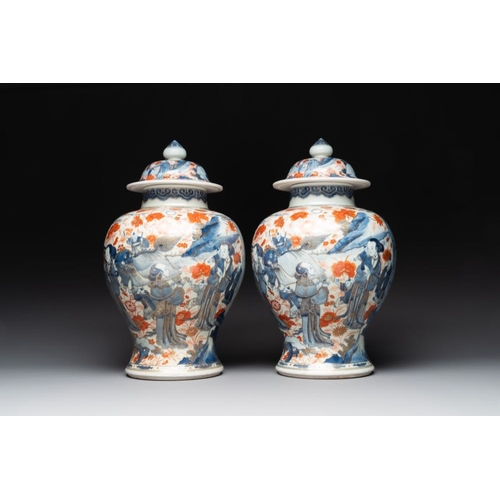 908 - A pair of fine Chinese Imari-style vases and covers with narrative design, KangxiH.: 43,5 cmThe abse... 