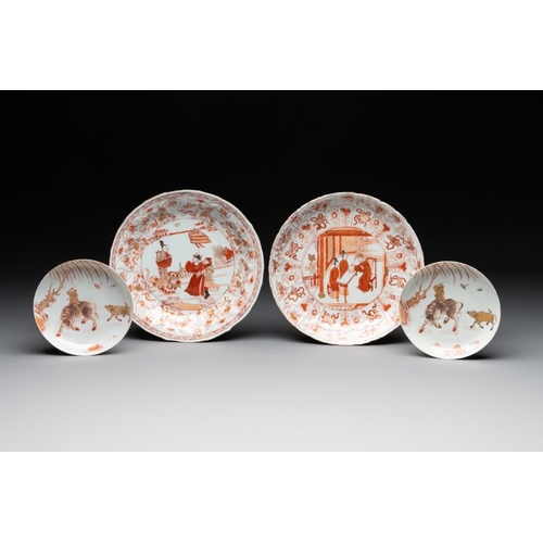 909 - A pair of Chinese iron-red saucers and two plates, Kangxi/YongzhengDia.: 22,5 cm (each plate)Dia.: 1... 