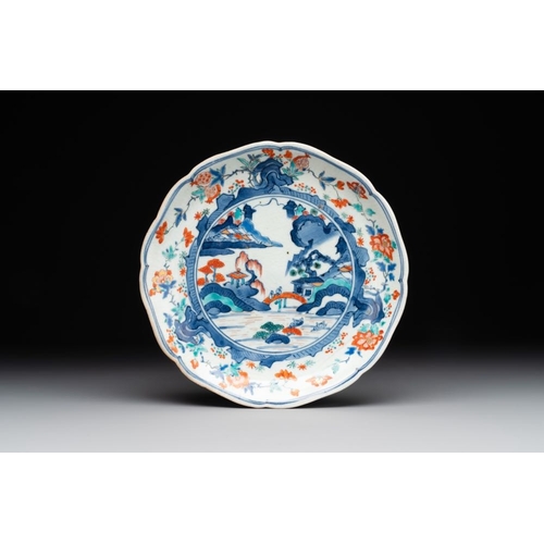 930 - A Japanese Hizen ware Kakiemon-style 'riverside landscape' plate, Edo, 17/18th C.Dia.: 22,3 cmThe ab... 