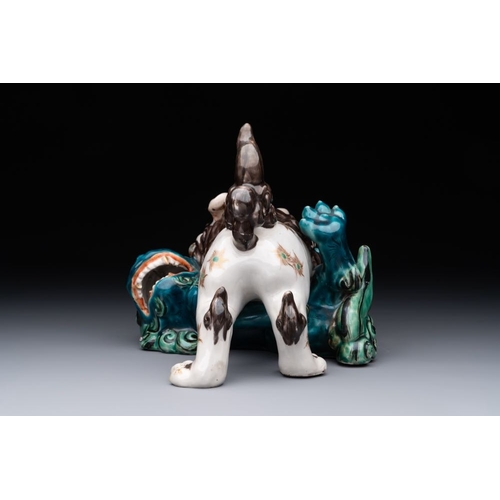 934 - A Japanese polychrome-glazed group of playing Buddhist lions, 18/19th C.Dim.: 20,5 x 18 x 16 cmThe a... 