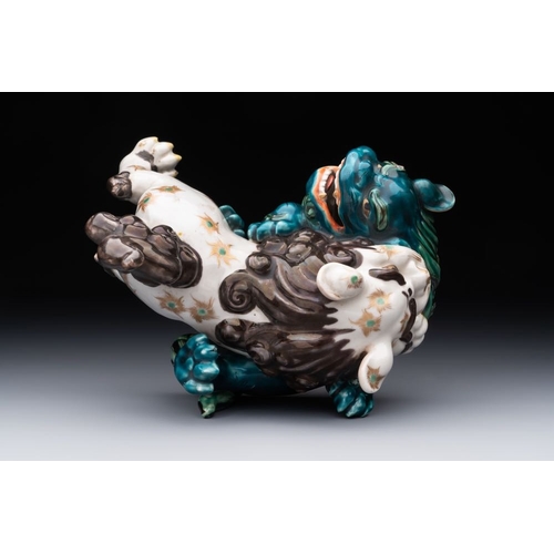 934 - A Japanese polychrome-glazed group of playing Buddhist lions, 18/19th C.Dim.: 20,5 x 18 x 16 cmThe a... 