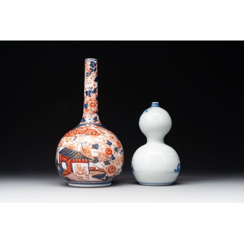 936 - A Japanese blue and white gourd vase, an Imari bottle vase and a set of five Satsuma cups, 19th C.H.... 