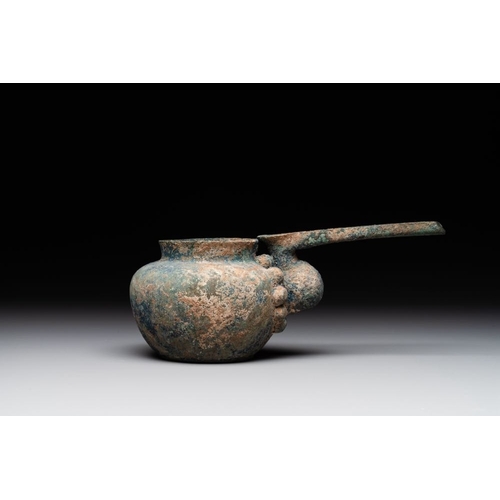 958 - A group of seven bronze and pottery objects, Syria, Persia, and Luristan, 3rd C. and earlierH.: 6,7 ... 