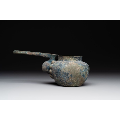 958 - A group of seven bronze and pottery objects, Syria, Persia, and Luristan, 3rd C. and earlierH.: 6,7 ... 