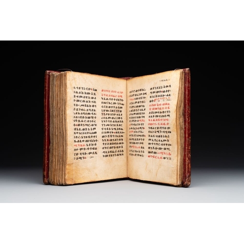 969 - A Coptic Amharic script bible in a leather case, 18th C.Dim.: 16,7 x 6 x 20 cm
 Provenance: - The co... 