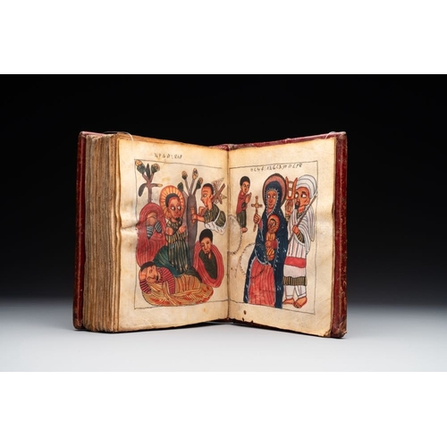 969 - A Coptic Amharic script bible in a leather case, 18th C.Dim.: 16,7 x 6 x 20 cm
 Provenance: - The co... 