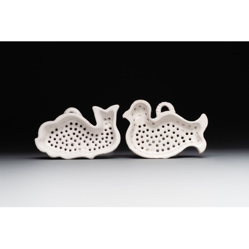 994 - Two white-glazed pottery strainers in the shape of a dove and a whale, France, 18th C.Dim.: 18,2 x 1... 