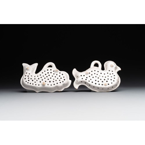 994 - Two white-glazed pottery strainers in the shape of a dove and a whale, France, 18th C.Dim.: 18,2 x 1... 