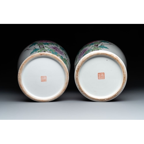 1007 - A pair of Chinese famille rose vases and two vases, Qianlong mark, 20th C.H.: 61 cm (the tallest)H.:... 