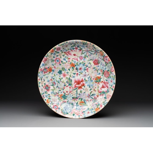 1009 - A Chinese famille rose 'millefleurs' dish and two plates, Qianlong and Jiu Jiang Jin Hua mark, 20th ... 