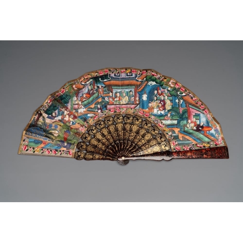 1028 - Two Chinese Canton gilt-lacquered and painted paper fans, one with original box, 19th C.Dim.: 48x 26... 