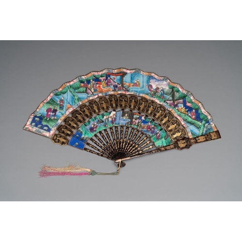 1028 - Two Chinese Canton gilt-lacquered and painted paper fans, one with original box, 19th C.Dim.: 48x 26... 