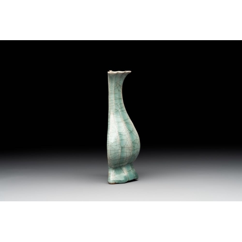 103 - A Chinese Longquan celadon lobed bottle vase, SongH.: 15,5 cm