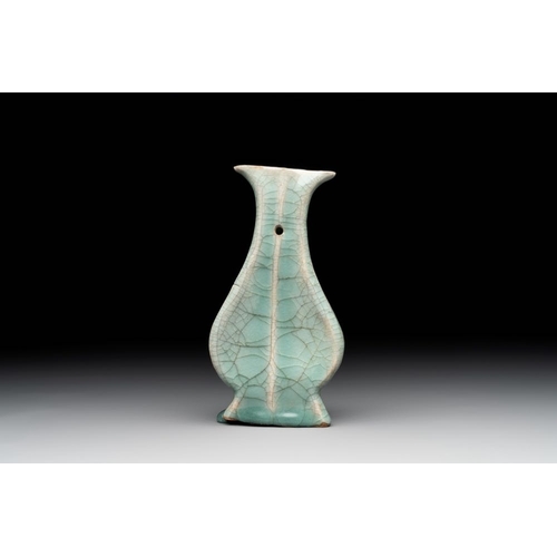 103 - A Chinese Longquan celadon lobed bottle vase, SongH.: 15,5 cm