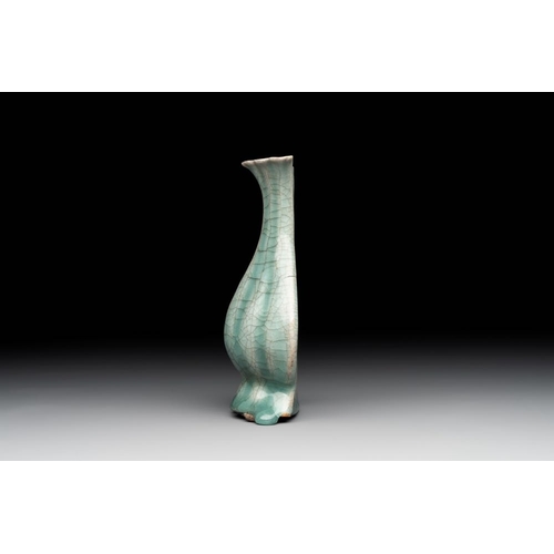 103 - A Chinese Longquan celadon lobed bottle vase, SongH.: 15,5 cm