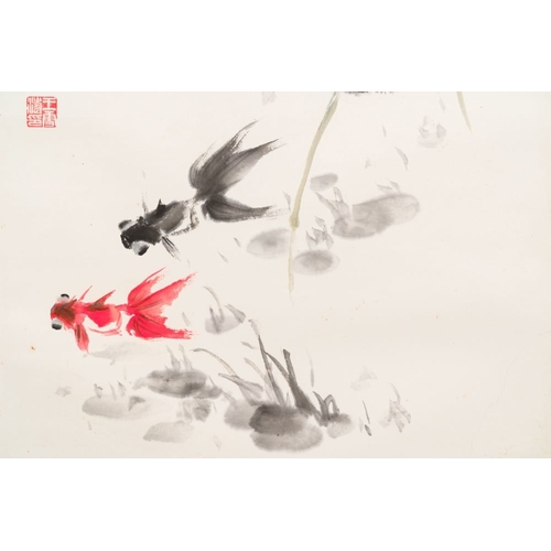 1044 - Wang Xuetao  (1903-1982): 'Goldfish and lotus', ink and colour on paperDim.: 212,5 x 54 cm (the scro... 