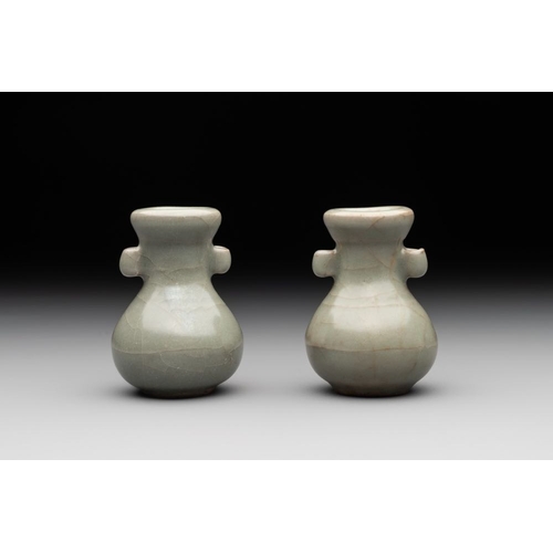 105 - A pair of Chinese Longquan celadon miniature 'touhu' vases, Song/YuanH.: 6 cm