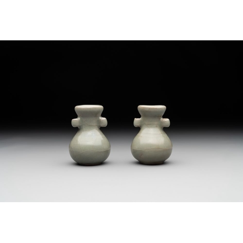 105 - A pair of Chinese Longquan celadon miniature 'touhu' vases, Song/YuanH.: 6 cm