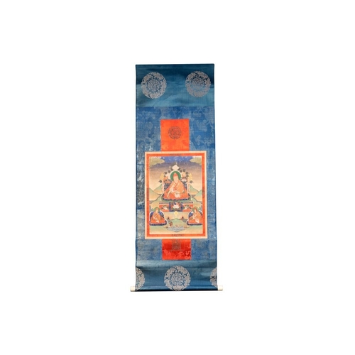 1055 - A Tibetan thangka depicting a lama, 19th C.Dim.: 120 x 43,8 cm (the mount)Dim.: 42,2 x 29,2 cm (the ... 