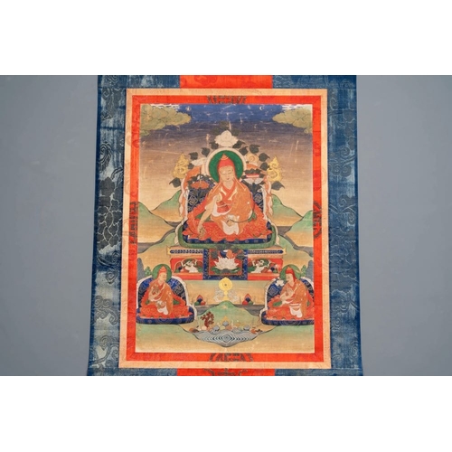 1055 - A Tibetan thangka depicting a lama, 19th C.Dim.: 120 x 43,8 cm (the mount)Dim.: 42,2 x 29,2 cm (the ... 