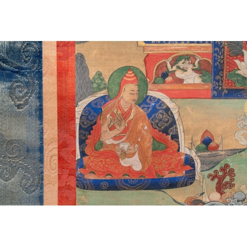 1055 - A Tibetan thangka depicting a lama, 19th C.Dim.: 120 x 43,8 cm (the mount)Dim.: 42,2 x 29,2 cm (the ... 