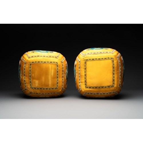 1061 - A pair of Chinese yellow-ground embroidered silk 'dragon' cushions, 19th C.Dim.: 27 x 27 x 24 cm... 