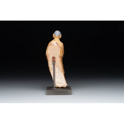 1067 - A Chinese gilt and polychromed stucco figure of a monk, MingH.: 25,5 cm (incl. stand)H.: 23,5 cm (ex... 