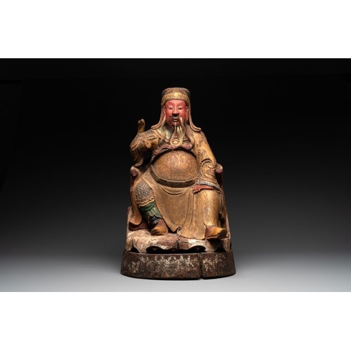 1069 - A large Chinese gilt- and polychromed wooden sculpture of a divinity, 19th C.H.: 66 cm
... 