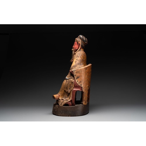 1069 - A large Chinese gilt- and polychromed wooden sculpture of a divinity, 19th C.H.: 66 cm
... 