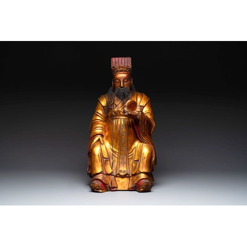 1070 - A Chinese gilt-lacquered figure of the star god Lu, 19th C.H.: 66 cm