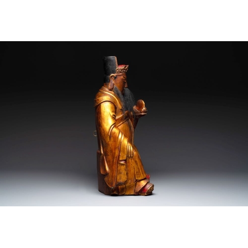 1070 - A Chinese gilt-lacquered figure of the star god Lu, 19th C.H.: 66 cm