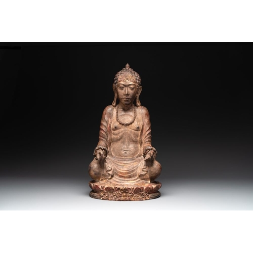 1077 - A Southeast Asian gilt-lacquered wooden sculpture of a praying ascetic, 18/19th C.H.: 55 cm
... 