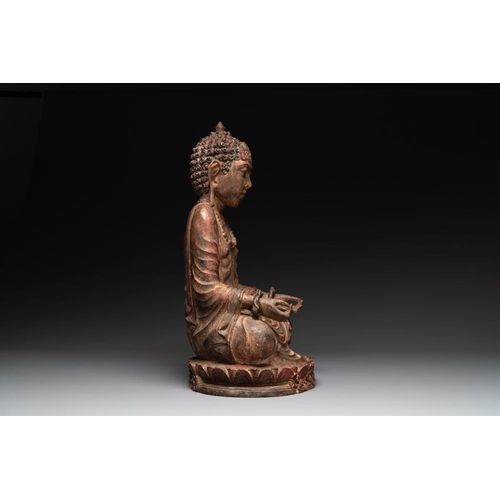 1077 - A Southeast Asian gilt-lacquered wooden sculpture of a praying ascetic, 18/19th C.H.: 55 cm
... 