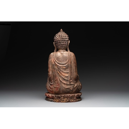 1077 - A Southeast Asian gilt-lacquered wooden sculpture of a praying ascetic, 18/19th C.H.: 55 cm
... 