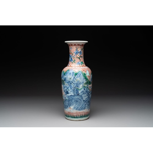 11 - A Chinese wucai 'mountainous landscape' vase, Transitional periodH.: 39 cm