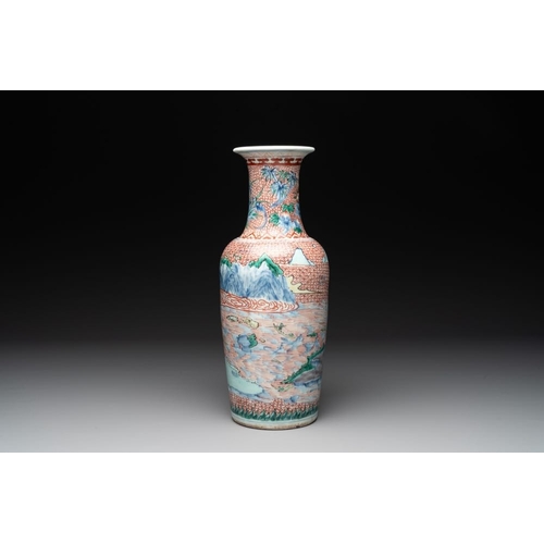 11 - A Chinese wucai 'mountainous landscape' vase, Transitional periodH.: 39 cm