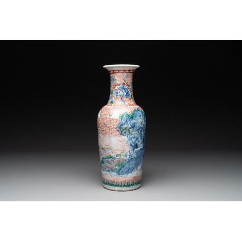 11 - A Chinese wucai 'mountainous landscape' vase, Transitional periodH.: 39 cm