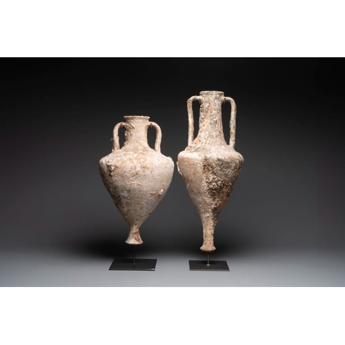 1123 - Two Roman terracotta wine or oil transport amphorae, 2nd/1st C. B.C.H.: 90,8 cm (the tallest incl. s... 