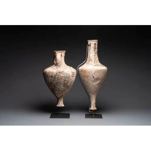 1123 - Two Roman terracotta wine or oil transport amphorae, 2nd/1st C. B.C.H.: 90,8 cm (the tallest incl. s... 