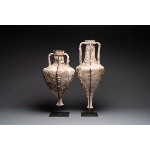 1123 - Two Roman terracotta wine or oil transport amphorae, 2nd/1st C. B.C.H.: 90,8 cm (the tallest incl. s... 