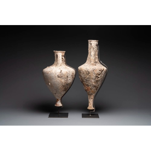 1123 - Two Roman terracotta wine or oil transport amphorae, 2nd/1st C. B.C.H.: 90,8 cm (the tallest incl. s... 