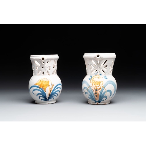 1131 - Three French white-glazed and two polychrome puzzle jugs, Nevers, 18th C.H.: 18,4 cm (the tallest)H.... 