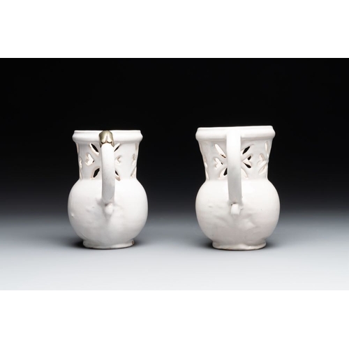 1131 - Three French white-glazed and two polychrome puzzle jugs, Nevers, 18th C.H.: 18,4 cm (the tallest)H.... 